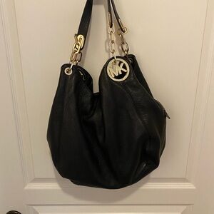 97 Michael Kor’s back hobo bag